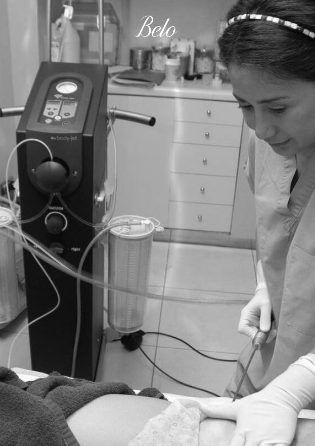 Dr. Eloisa Buse performing aqualiposuction in the early 2000s.